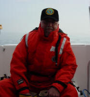 Wearing a survival suit during the search for Northwest Airlines Flight 2501